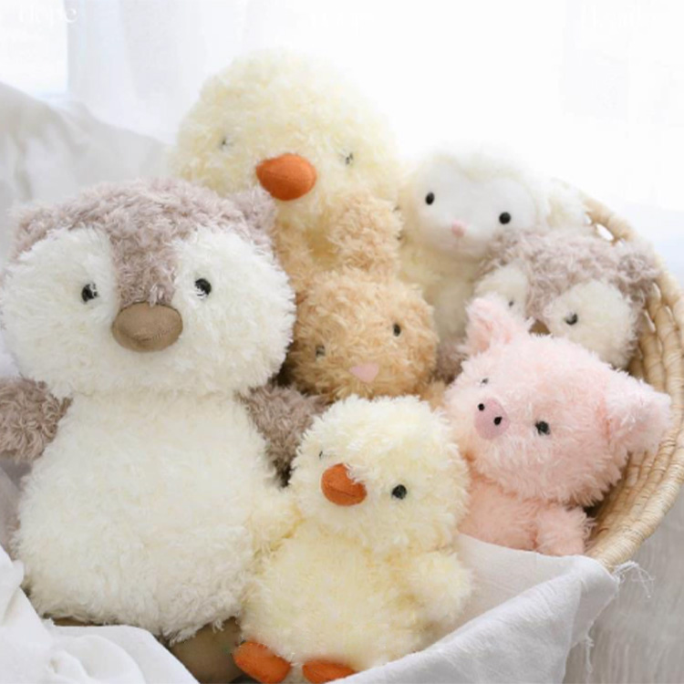 Jouets en peluche aux animaux aux cheveux bouclés