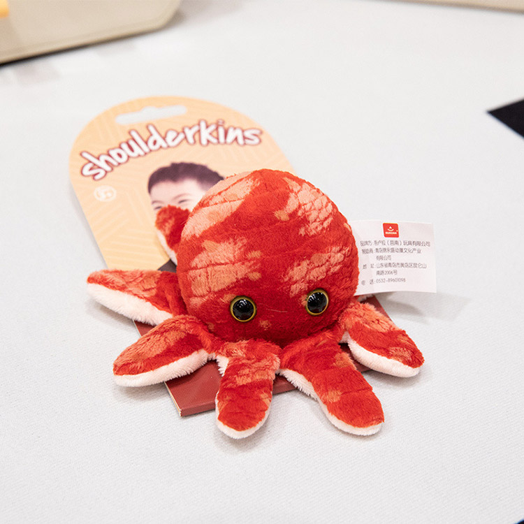 Peluche à épaule magnétique